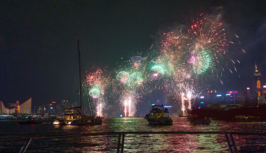 Firework in Victoria Harbour in Hong Kong by Maurice Ping Leung