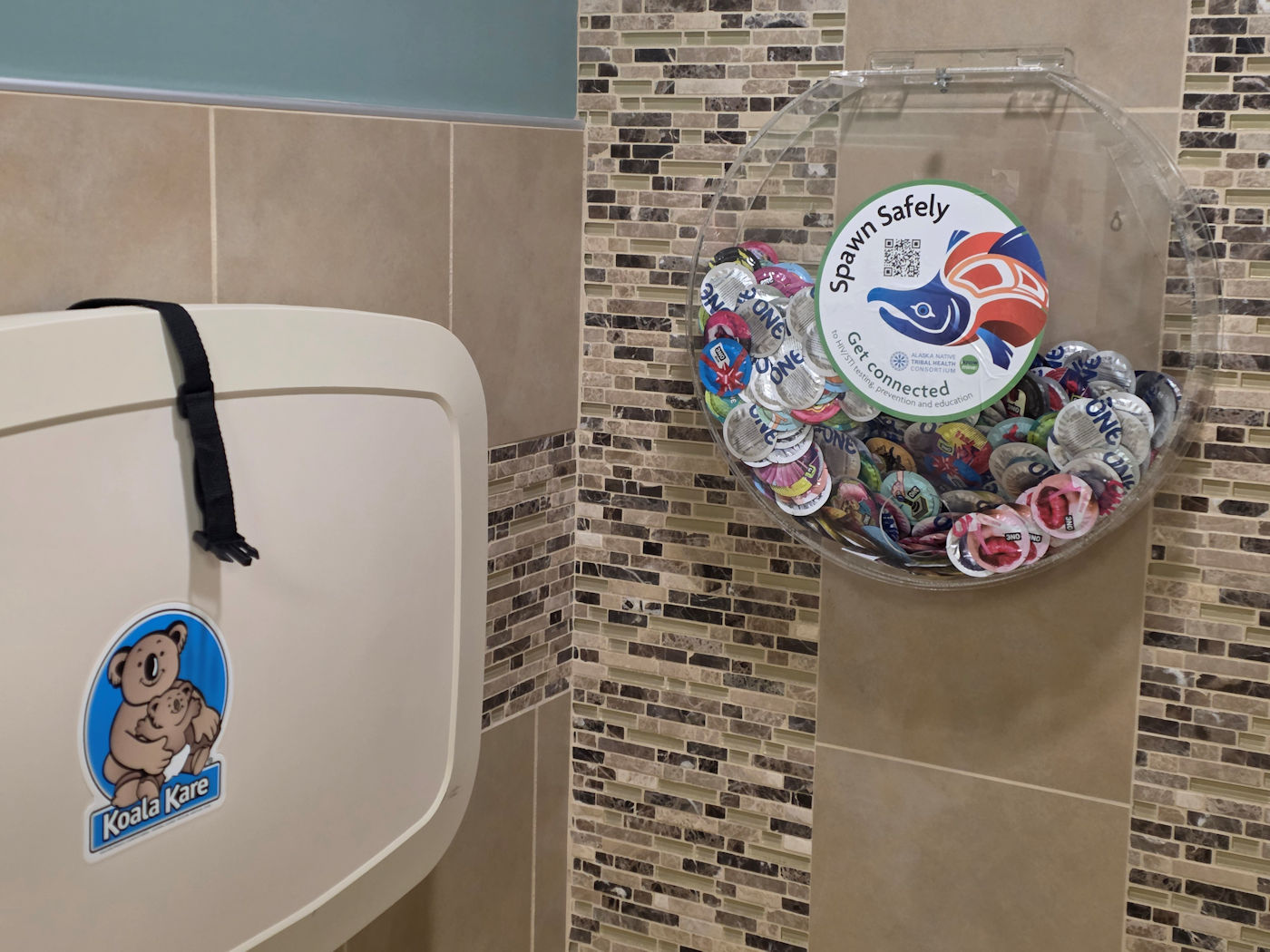 Condoms in Womens' Bathroom by Birgit Langmann