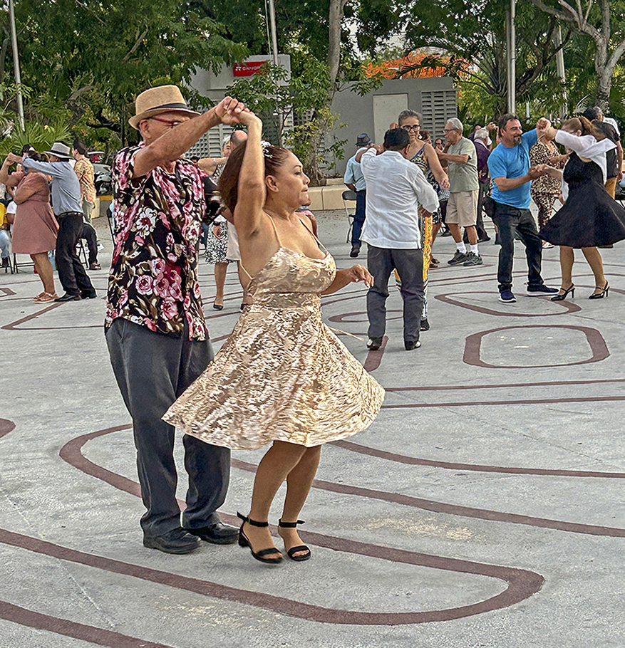 Sunday in the park, Cancun by Leslie Larson