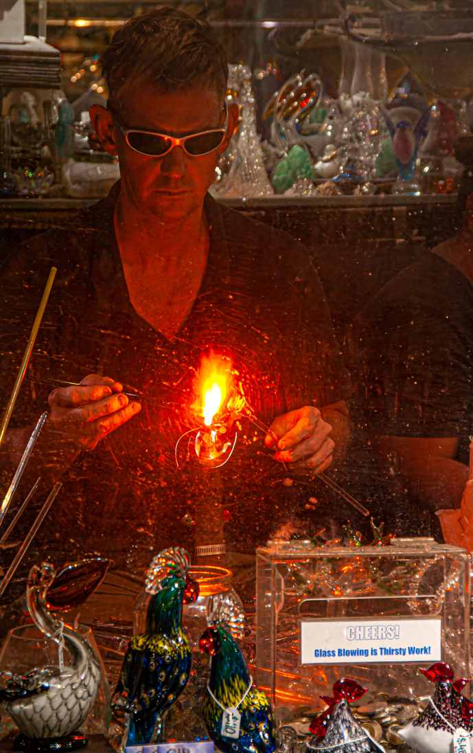 Glass Blowing is thirsty work by Ron Davis