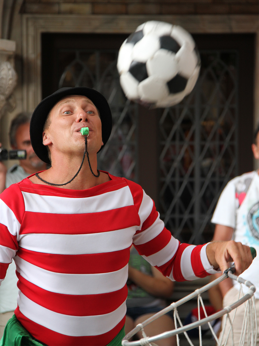 Mime with soccer ball by Tom Brott