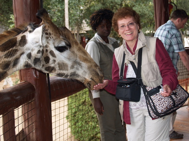 FEEDING THE GIRAFFE-NAIROBI, KENYA by Alan Lichtenstein