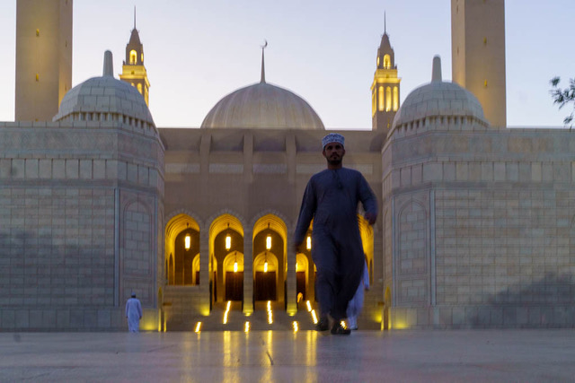 Exiting tThe Sultan Qaboos Mosque in Oman, at sundown