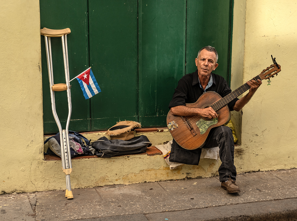 Street Musician in Havana by Tom Tauber