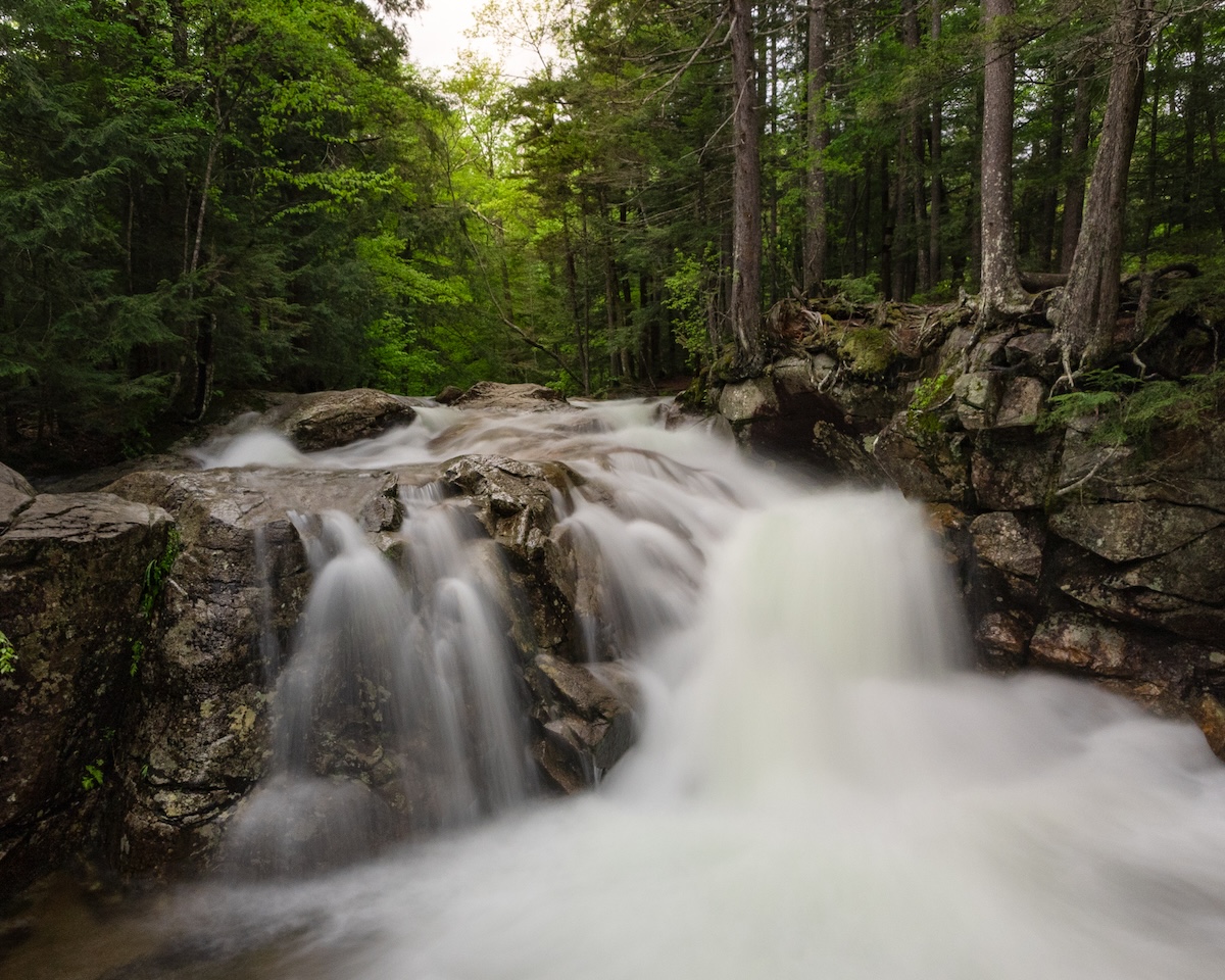 The Basin Waterfall in Franconia, New Hampshire USA by Kelsey Swanson