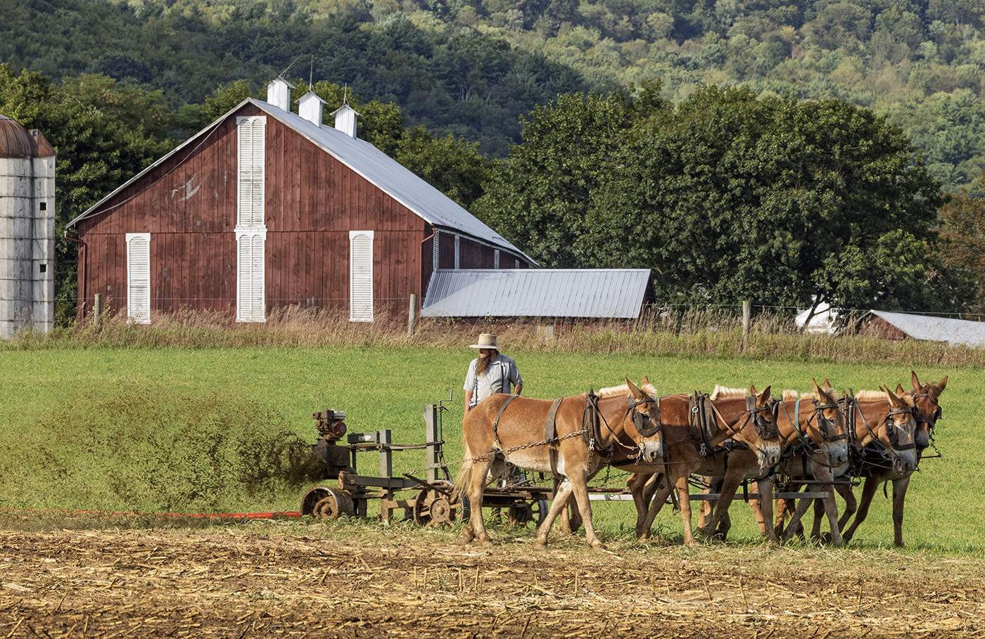 Fertilizing the fields by Tom Brott