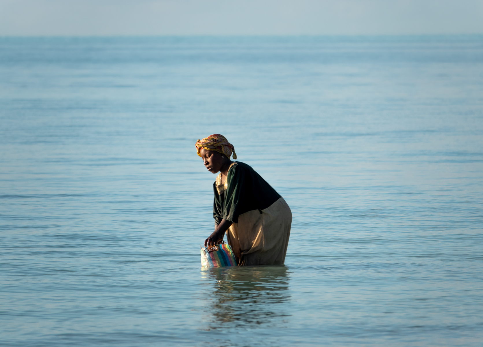 Seaweed Collector of Jozani Beach by Sylvie Tas