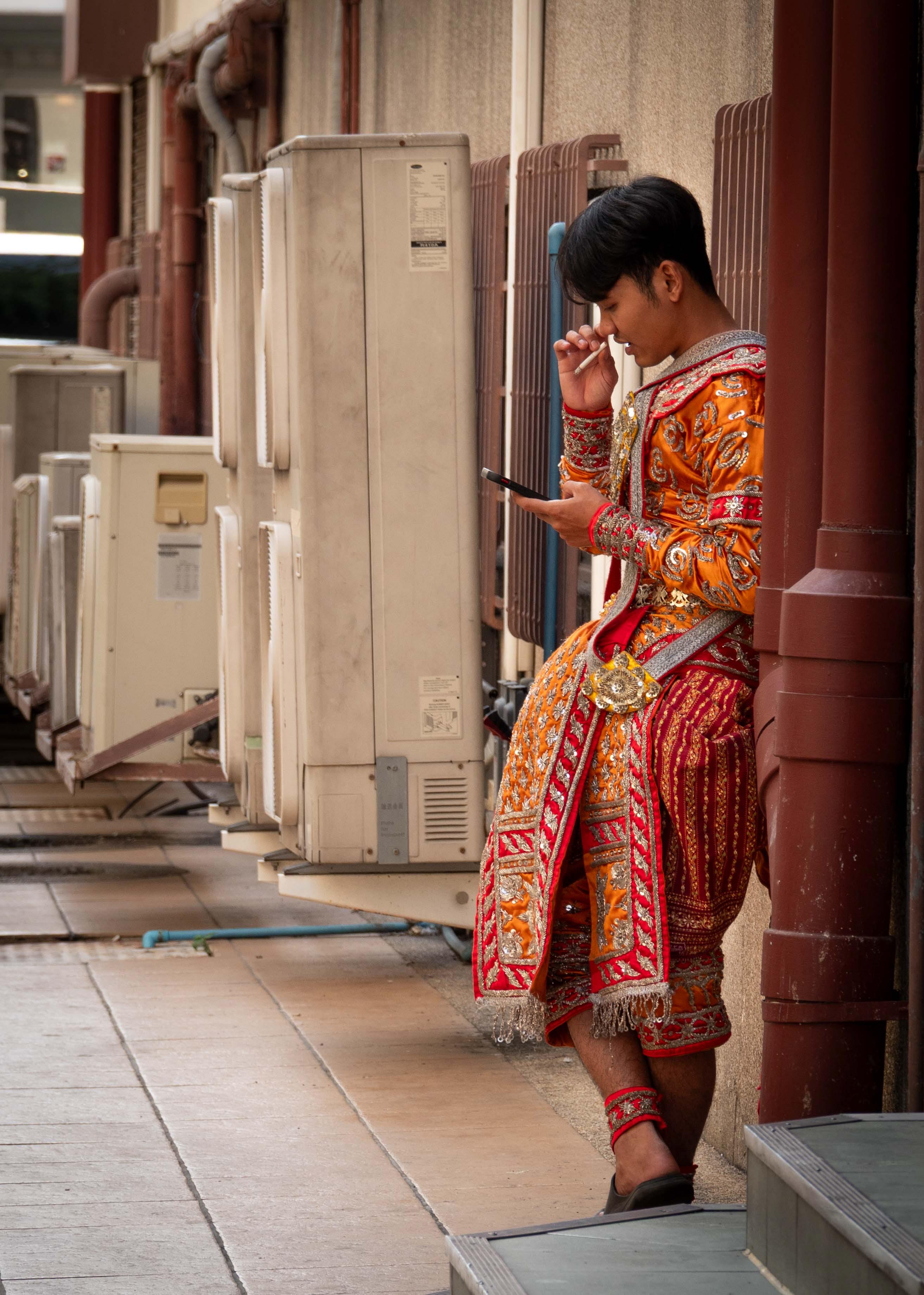 A performer from Sala Chalermkrung Royal Theatre on break, Bangkok, Thailand