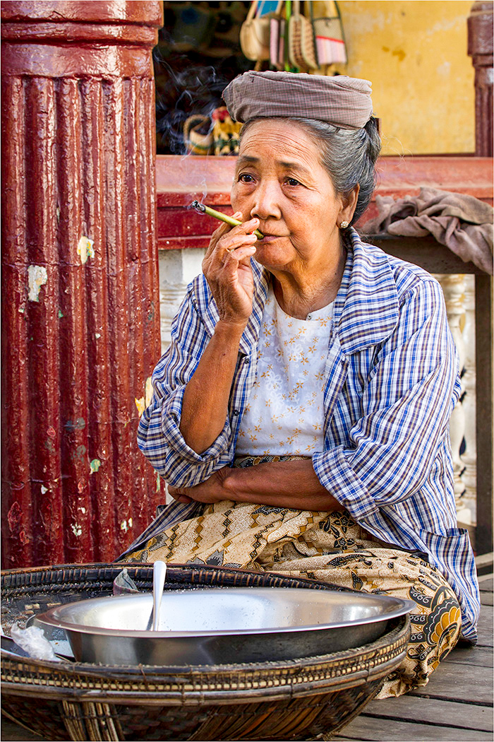 Cheroot smoking woman by Shirley Bormann