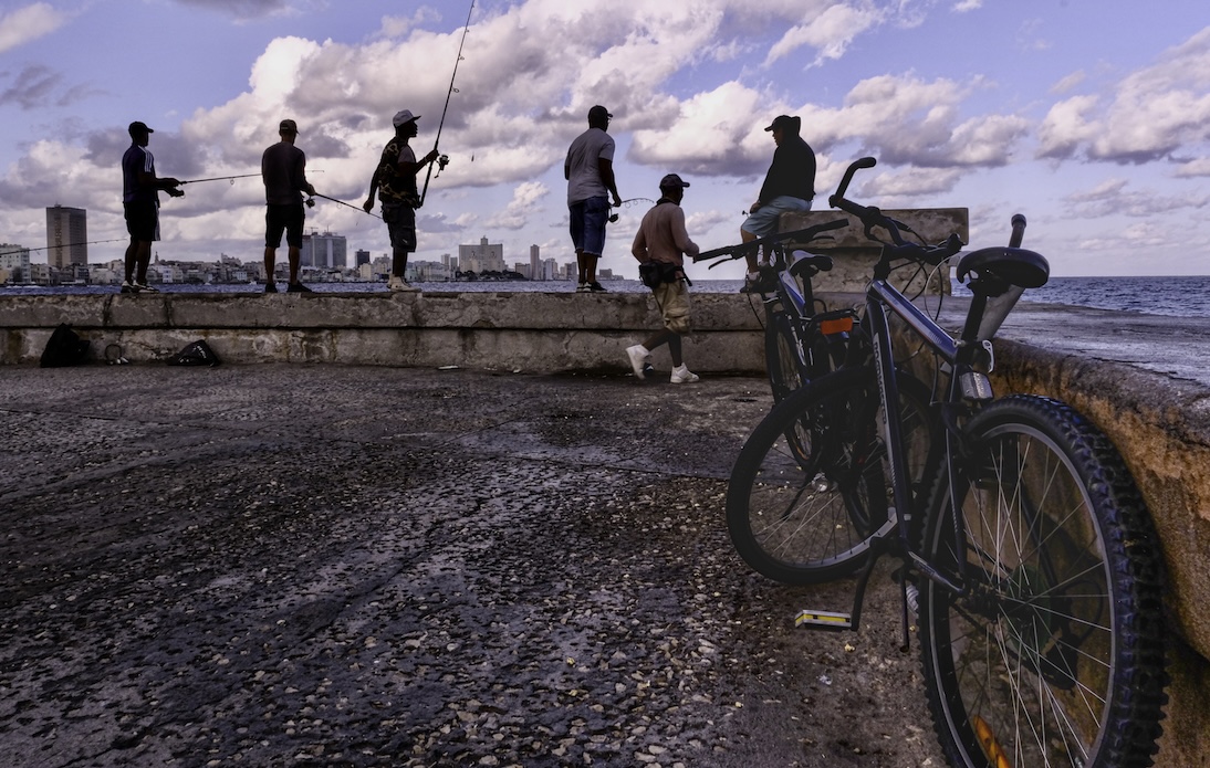 Fishermen on the Malecon by Laurie Bergner