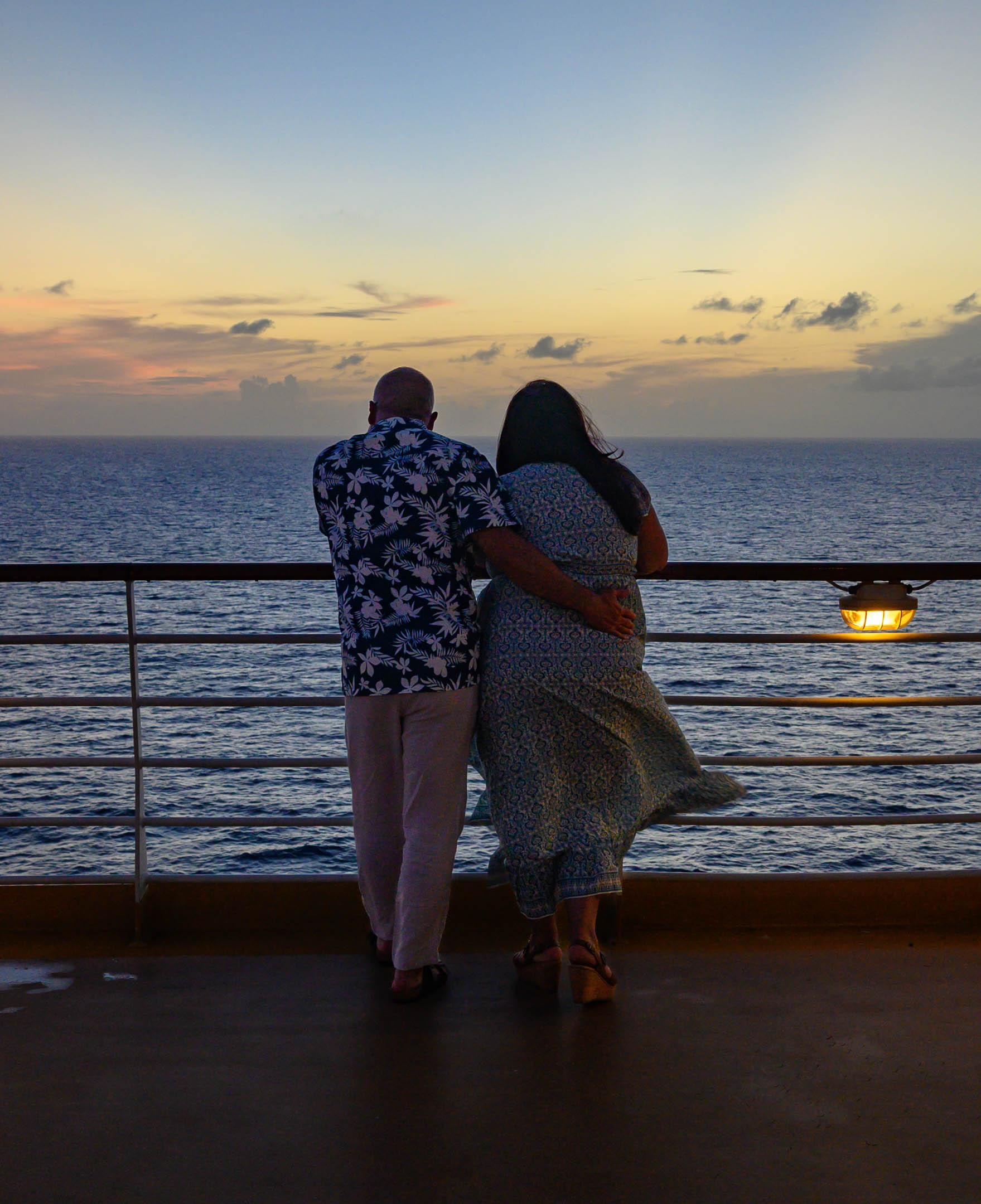 Couple & the setting sun by Jay Denny